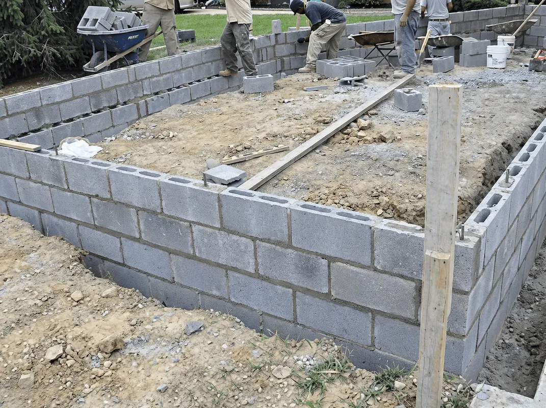 Professionals building a foundation with blocks in Chula Vista, CA