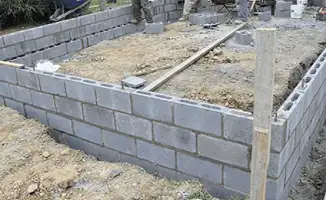 Professionals building a foundation with blocks in Chula Vista, CA