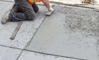 Professional repairing a concrete floor in Chula Vista, CA