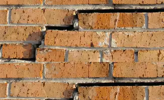 Brick wall with serious structural damage in Chula Vista, CA